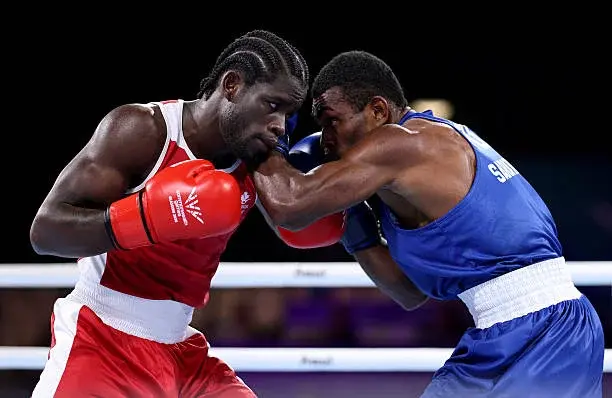 Two boxers exchanging punches at close range